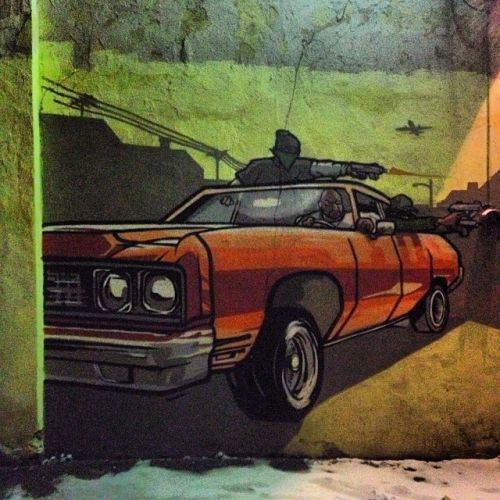 Граффити классической иллюстрации к San Andreas – Drive By на стене дома в России
